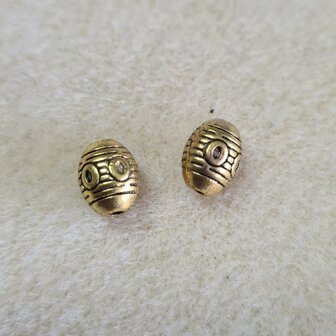 Goldplated metaalkraal bewerkt 6x8mm